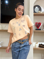 CAMISETA OVERSIZE ILUSTRADA  "SI NO SON TUS METAS NO TE METAS"